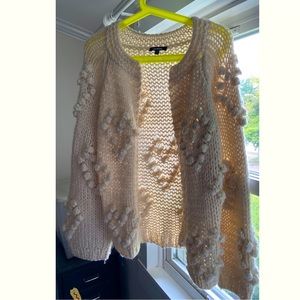 Cream cardigan with heart Pompoms